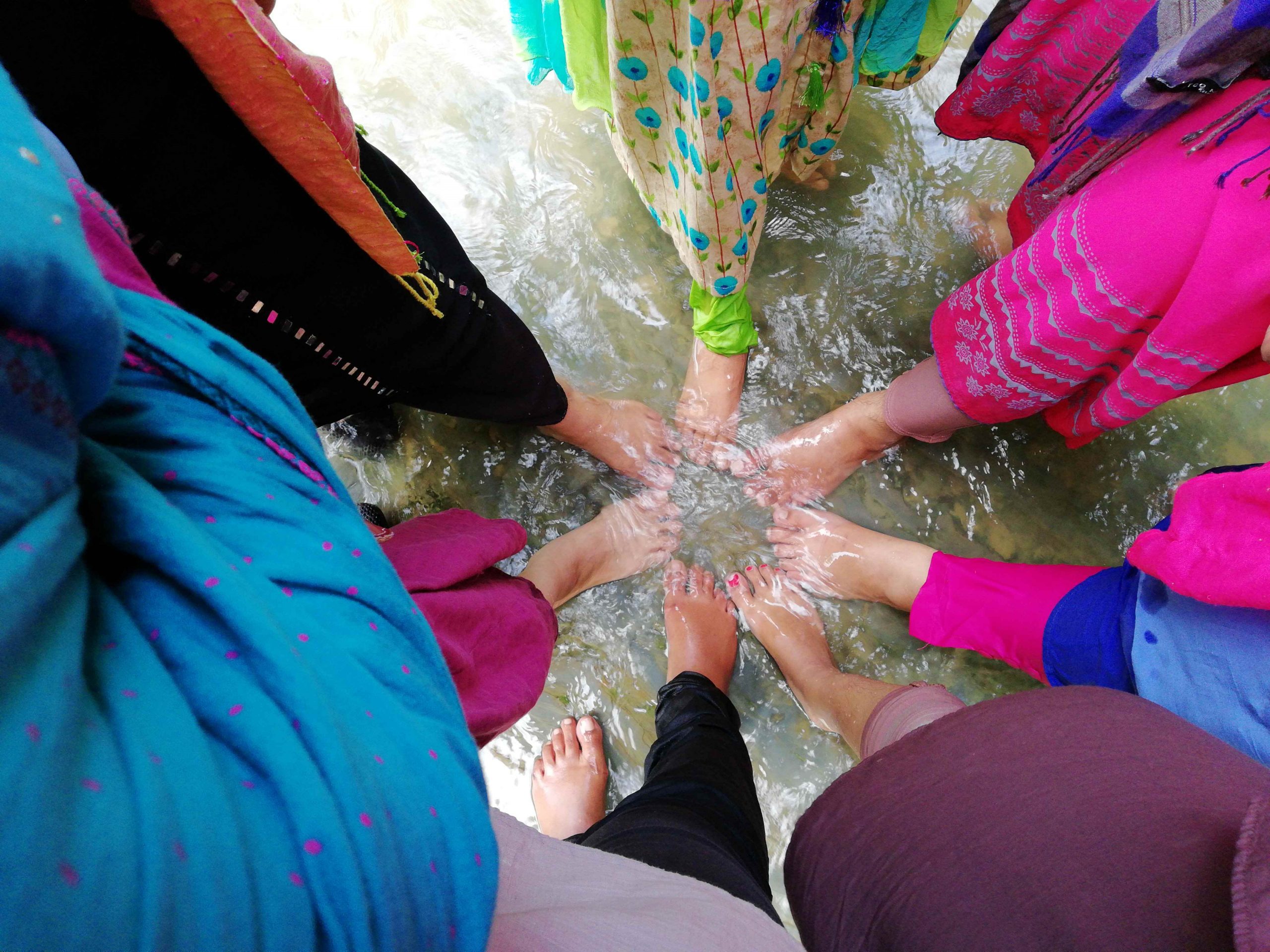 A group of girls enjoying Risang Waterfall