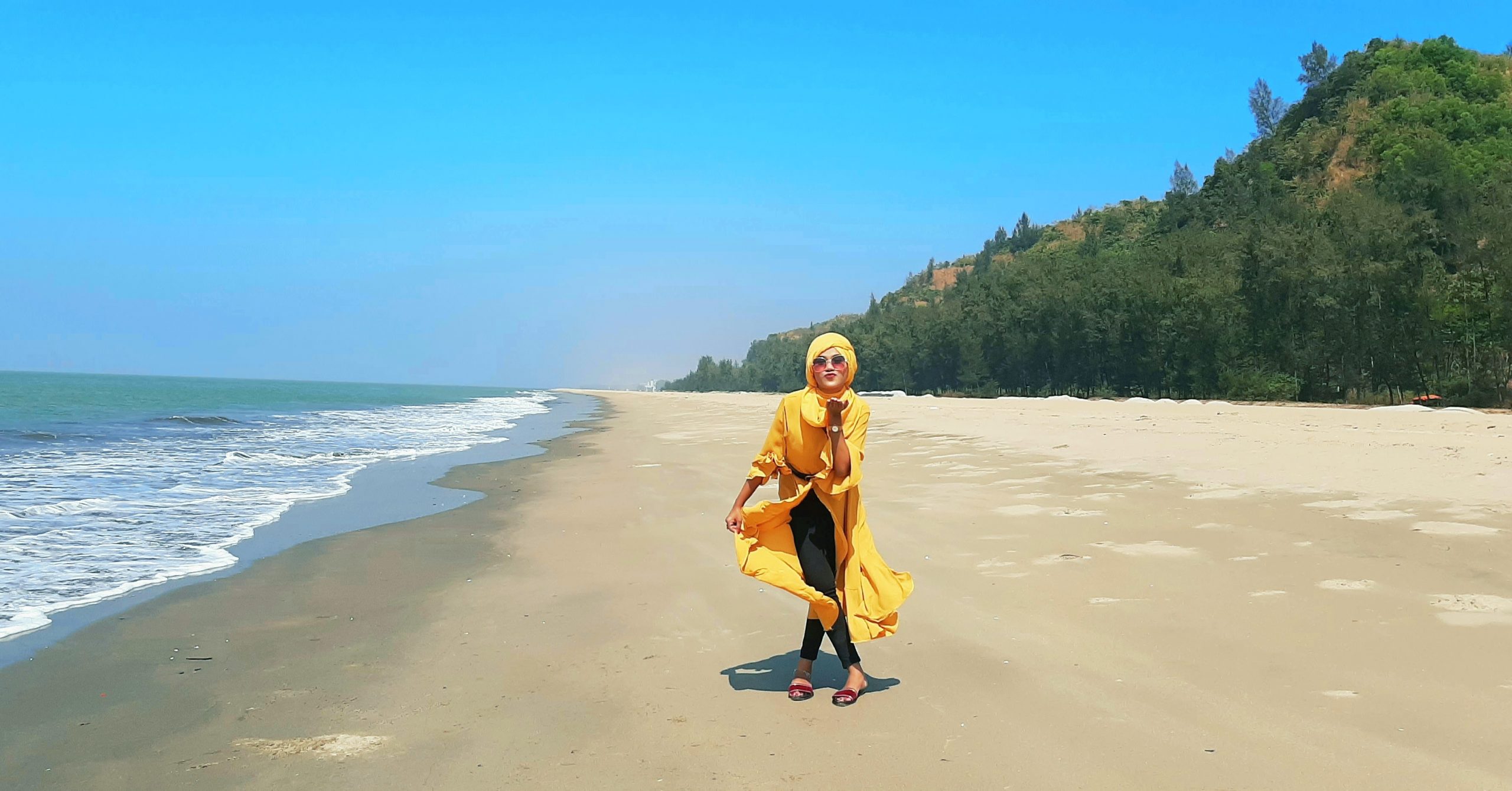 A girl is enjoying the natural beauty of Cox's Bazar